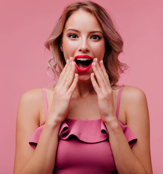 Excited lady with short curly hair summer pink
